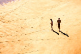 Two on beach at Kaiteriteri 