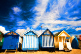Four beach huts at Southend on Sea, Essex