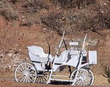 Old buggy on the side of the mountain entering Oatman.
