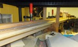 View of glued up track through shelving