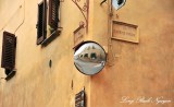 reflective mirror, San Gimignano, Tuscany, Italy 