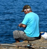 preparing the hook, Boca Do Inferno, Cascais, Portugal
