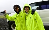 Nancy and Katherine in rain gears, David in car  