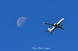 Alaska Airlines B-737 with Moon 