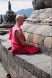 Monk Praying at Borobudur Temple
