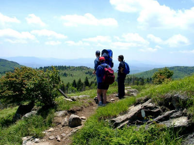 Hikers survey Grayson Highlands State Park from the Appalachian Trail