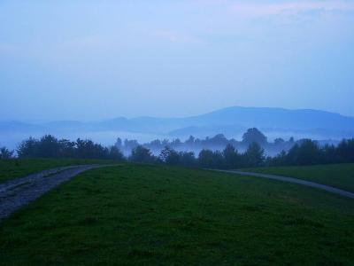 Early Evening Fog rolls over mountains surrounding the Fox Hill Inn