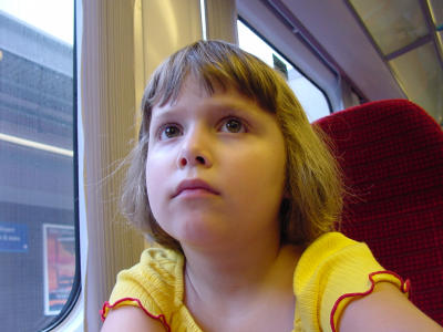 Alyson riding the train to London.jpg