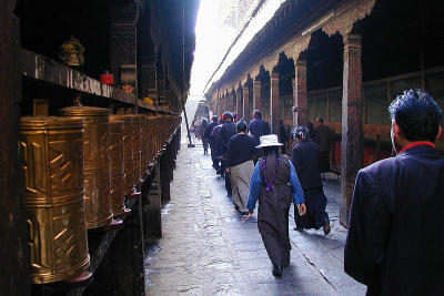 153 - Pilgrims in the Jokhang, Lhasa