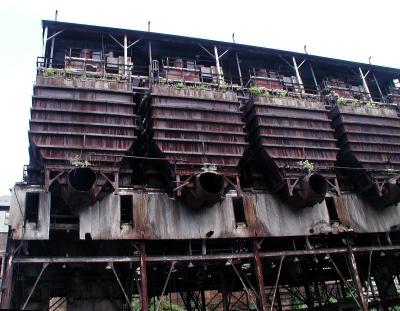 These look like window boxes, but are coal hoppers or part of an old slab caster