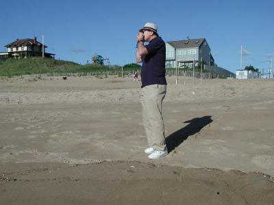 Ron photographs the beach as I photograph him!