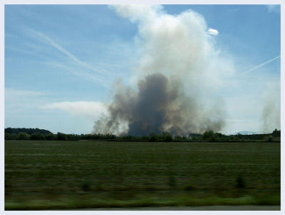 Then it's on to Portland...A grass fire from the car heading to Portland.