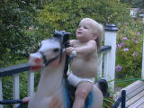 Kaelyn rides her horsie