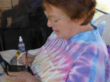 Joan polishes her<BR>PalmPilot skills