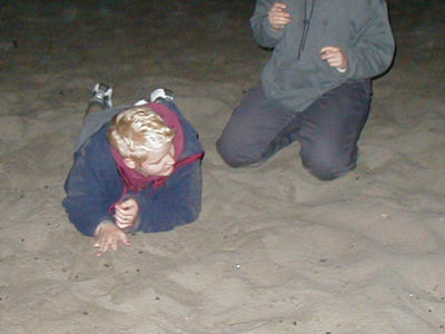 SarahJane & Jen wrestle in the sand!