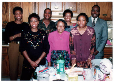 Charlie Smith writes:  This photo was taken at my 50th birthday party in October 1993. 
Left to right, my sister Eloise and Mildred, brother Billy, mother Geraldine Smith, sister Annette and Lucille and myself Charles Smith Jr. 
