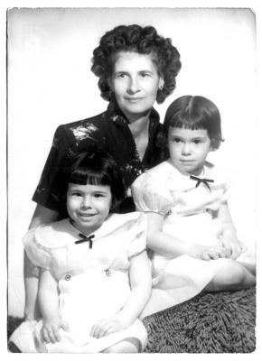 Rose is the mother, Betty and Barbara are her daughters.  Betty is on the left.