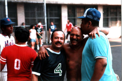 Mr. Acosta gets a head kiss from Ricky Young? Georgie Quintana laughs