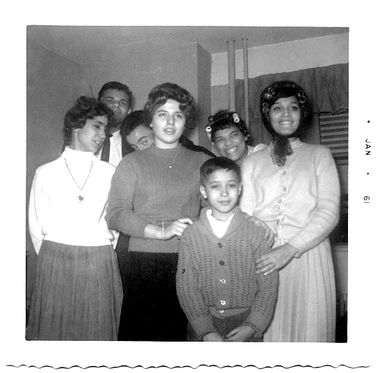Angie Cruz, her mother taught at St. Pauls, Ray, Frankie hiding, ?(girl in center), Carmen, Jenny Millan, Louis Millan, jenny's brother up front.