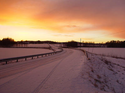 Swedish winter road by Kjell Olsson