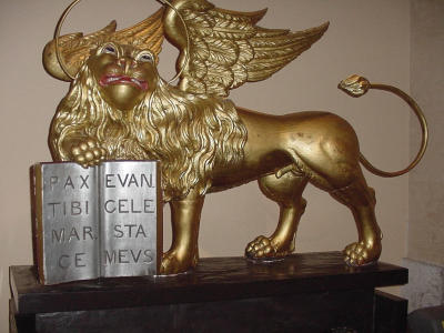 I just loved the face on this angelic lion.  The halo, wings, and cute tail intrigued me.  Now, if I only knew Latin!