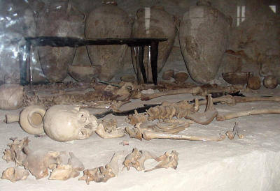 A simple burial site with actual skeletons.