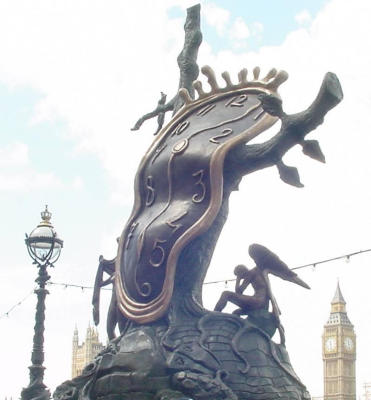 A close-up of Dali's work with Big Ben in the background across the River Thames.