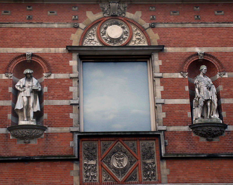 Brick wall with statues.jpg