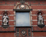 Brick wall with statues.jpg