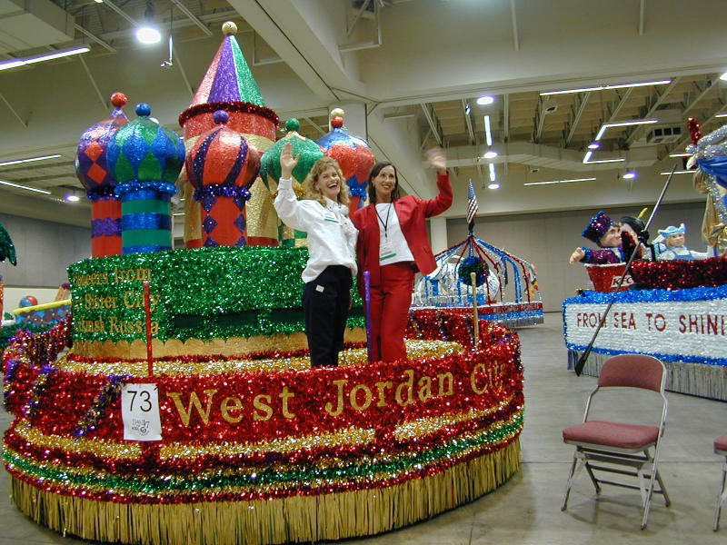 a polite wave from the float