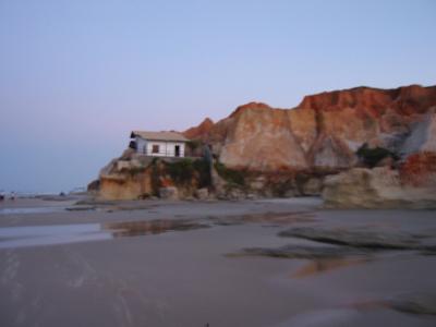 Tide pulls in right to the rocks, can only leave some homes at low tide