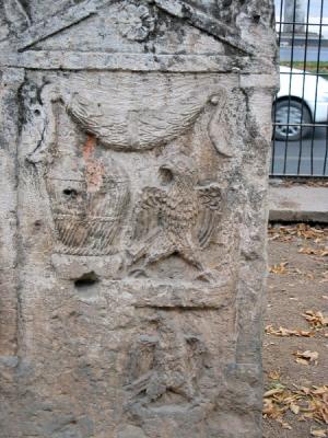 Eagle motif representing the Roman Period man and<br>wool basket motif representing the woman