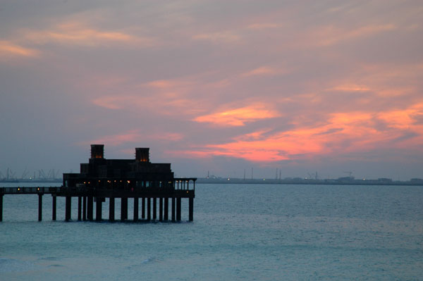 The Palm Jumeirah behind a pier at Madinat Jumeirah