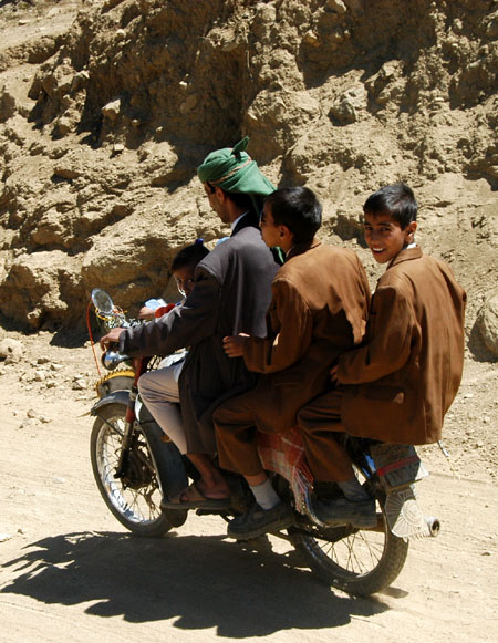 Family of 4 on a motorbike