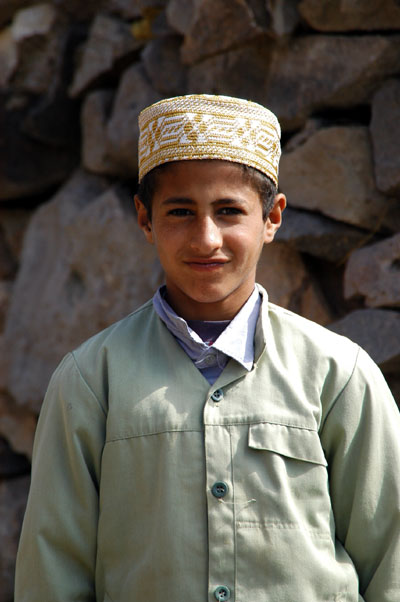 Boy with the local headgear, Yemen