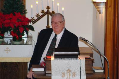 Bob Grupp in Pulpit on Christmas Eve at St. John's United Church of Christ - Photo by Andrew Grupp