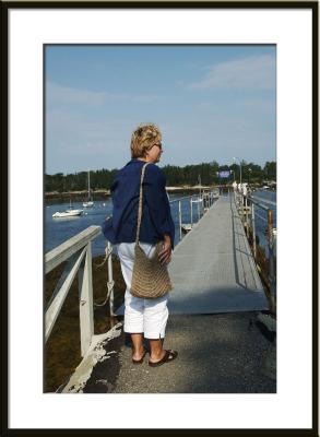 Liz checks out the town docks across the street, then it's back home to pack.