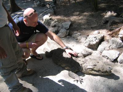 Brian befriends a crocodile, Crococun Zoo, Puerto Morelos, Quintana Roo