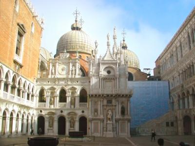 Renaissance courtyard of Doge's Palace (right). Doge (Duke) lived here from 1150-1550 - seat of power. Background: Basilica