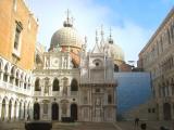 Renaissance courtyard of Doges Palace (right). Doge (Duke) lived here from 1150-1550 - seat of power. Background: Basilica