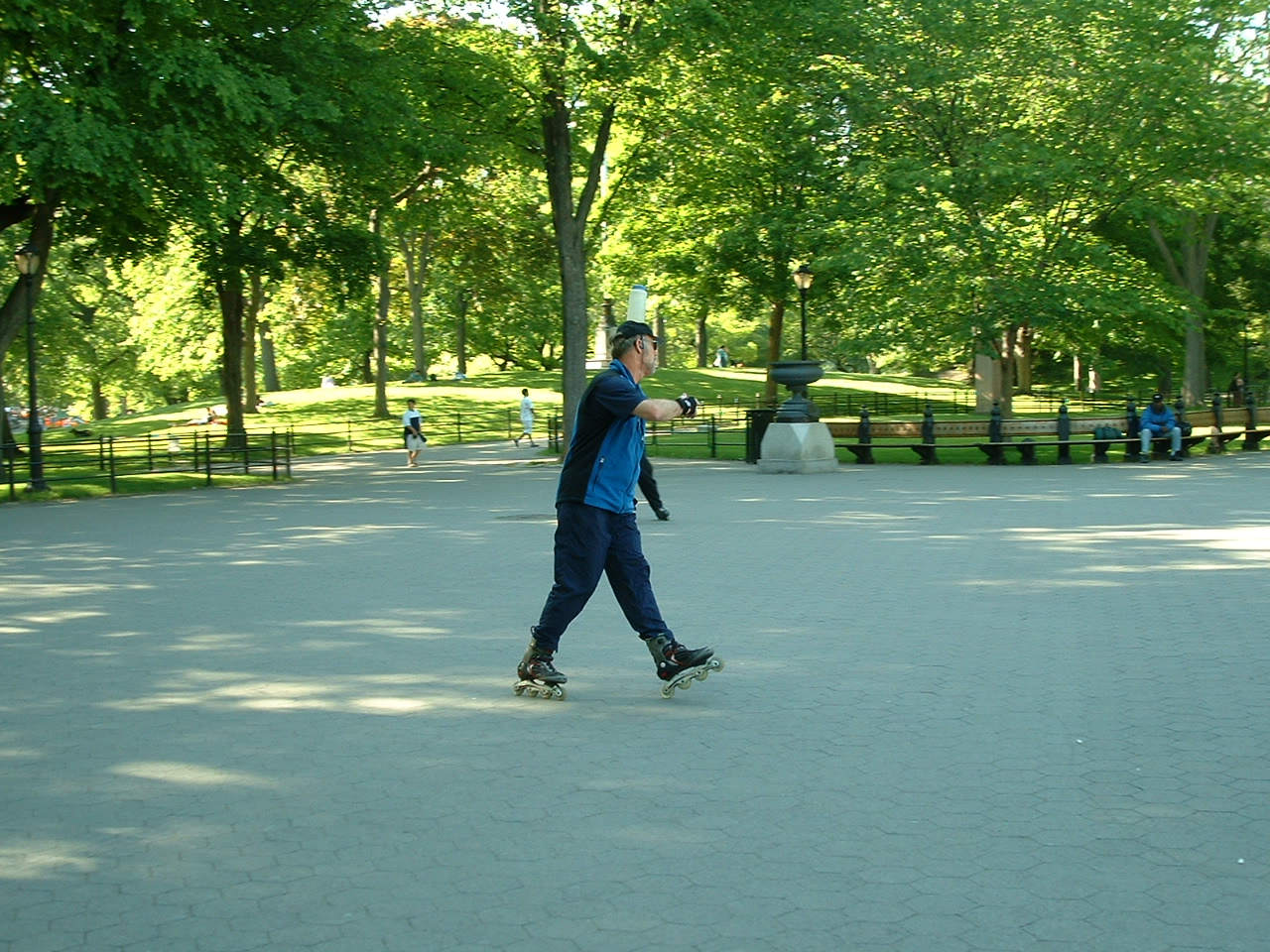 Acrobatic Skater w/Water Jug on Head