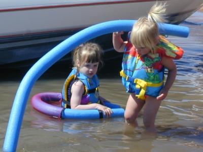 Taya and Kaelynplay in the water