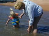 Kaelyn and Gramma<br>splash in the water<br>at Lake Powell