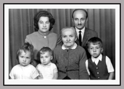 Mr. and Mrs. Vladimir Szaryj, their children and Grandma Szaryj
