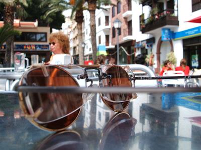 sunglasses, caf table