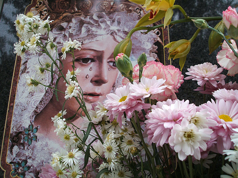 crying madonna and flowers