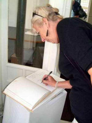 Martha signing the guestbook