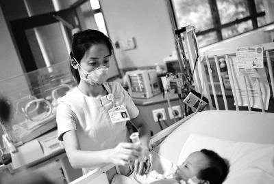 Paediatric Nurse Tube Feeding Infant