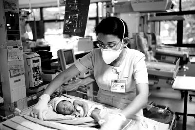 Paediatric Nurse and Infant