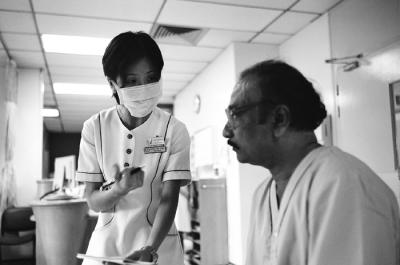 Cardiology Nurse Giving Discharge Advice